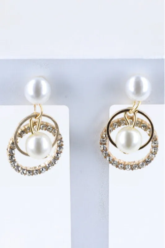 Aretes Doble Circulo Brillos sold by Shasa