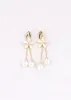 Aretes Flor Cristal Perlas sold by Shasa