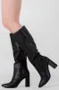 Bota estructurada larga puntual sold by Shasa