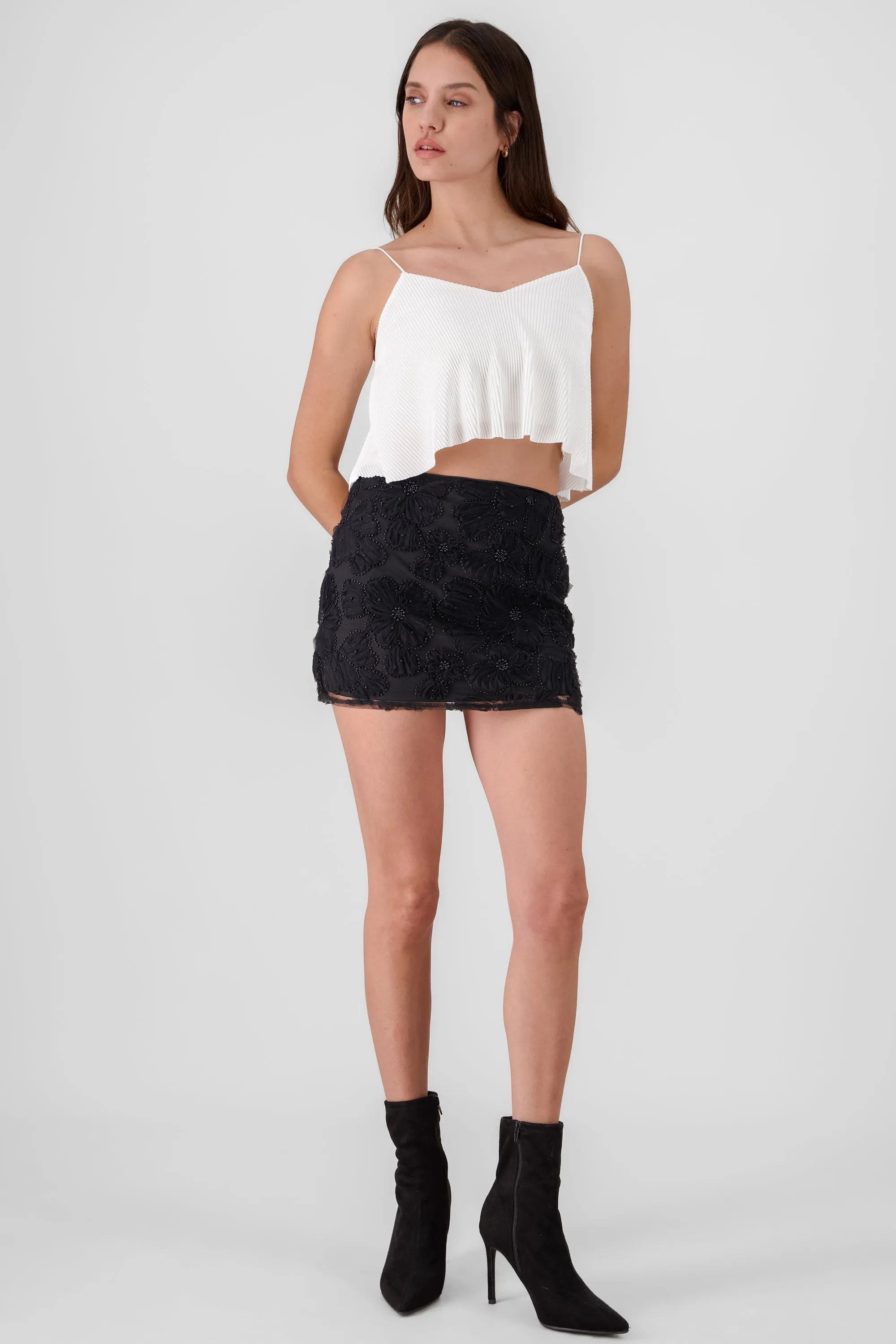 Mini falda flores lentejuela sold by Shasa