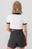 Top tejido contraste cuello polo sold by Shasa
