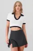 Top tejido contraste cuello polo sold by Shasa