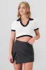 Top tejido contraste cuello polo sold by Shasa