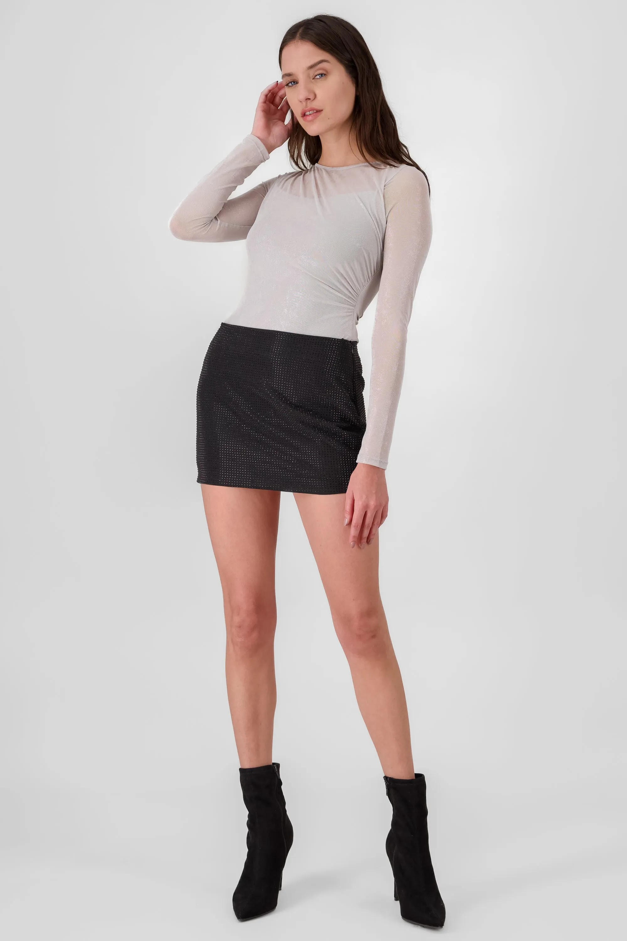 Falda mini de brillos sold by Shasa