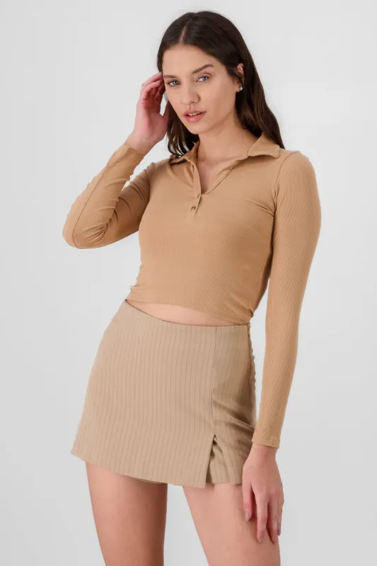 Top cuello polo sold by Shasa