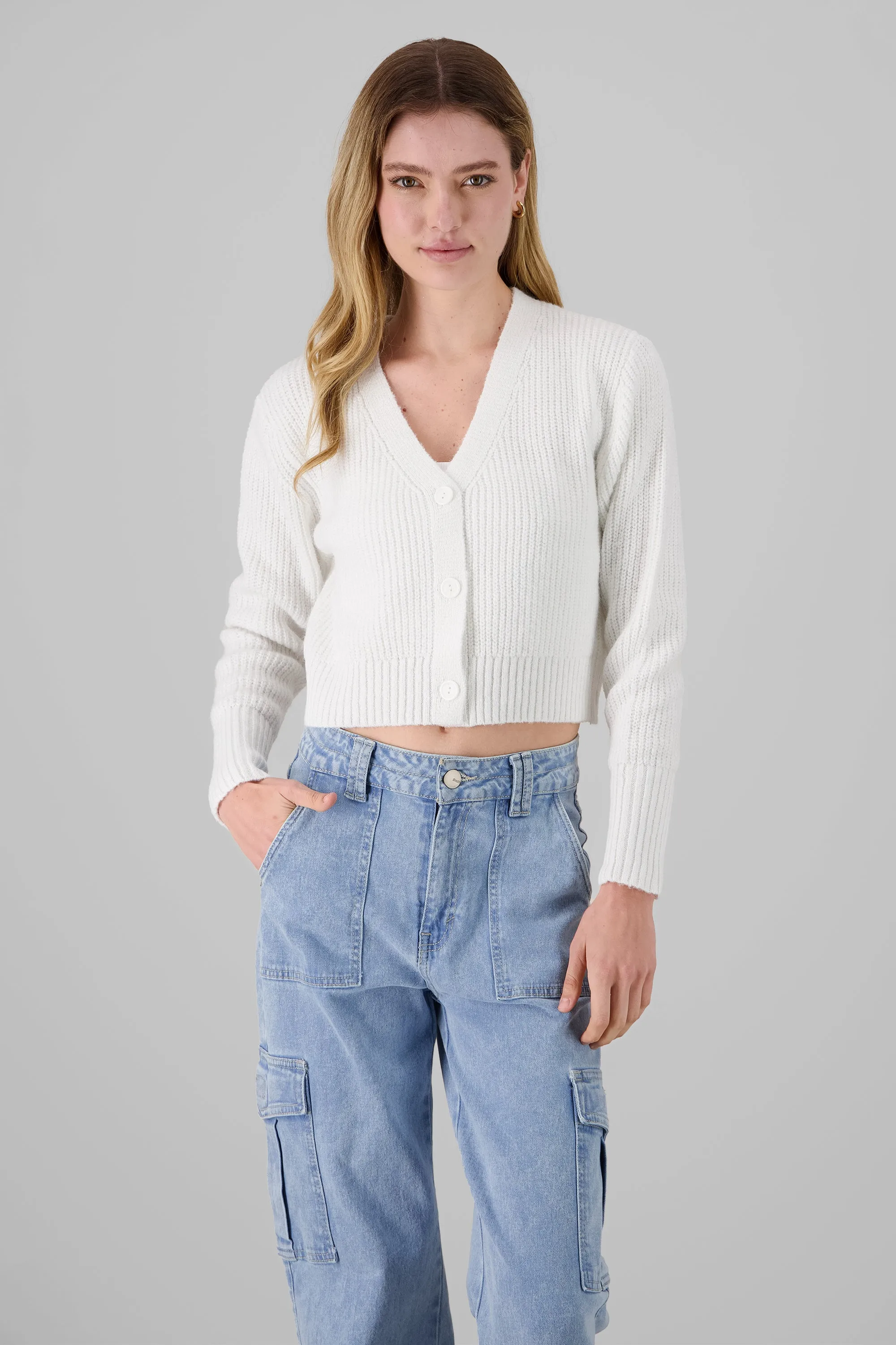 Cardigan de tejido con botones sold by Shasa