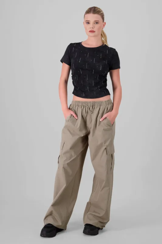 Pantalon parachute bolsas cargo sold by Shasa