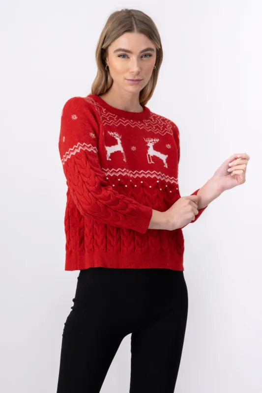 Suéter navideño renos perlas sold by Shasa