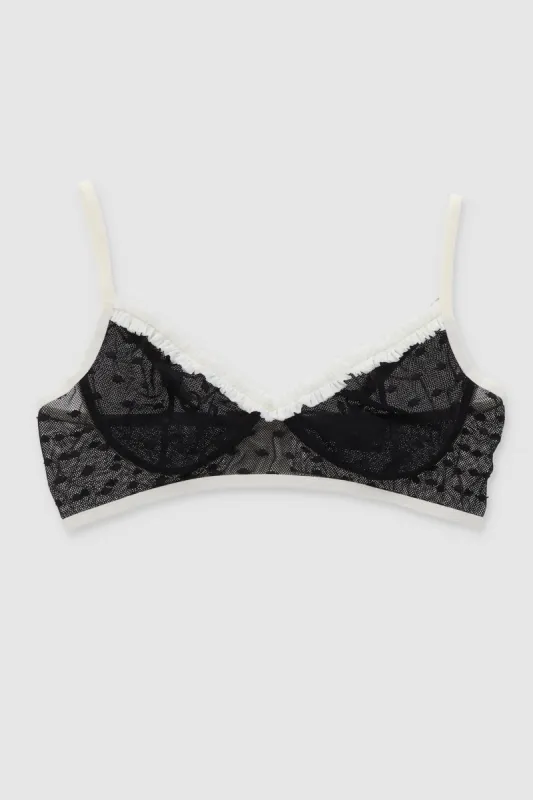 Bralette de olanes con puntos sold by Shasa