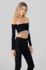 Top crop manga larga con brillos sold by Shasa