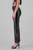 Pantalones flare PU pretina ancha sold by Shasa
