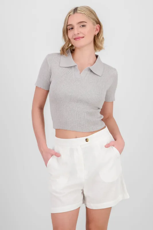 Top tejido cuello polo manga corta sold by Shasa