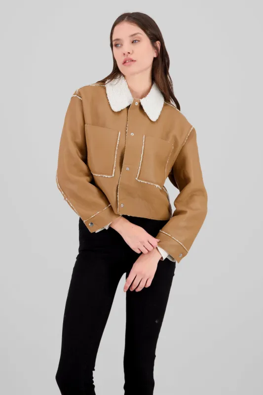 Chamarra con bolsas y peluche sold by Shasa