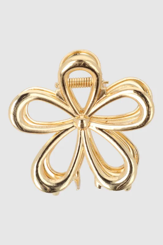 Pinza flor metalica sold by Shasa
