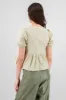 Blusa mangas abullonadas detalle moños sold by Shasa