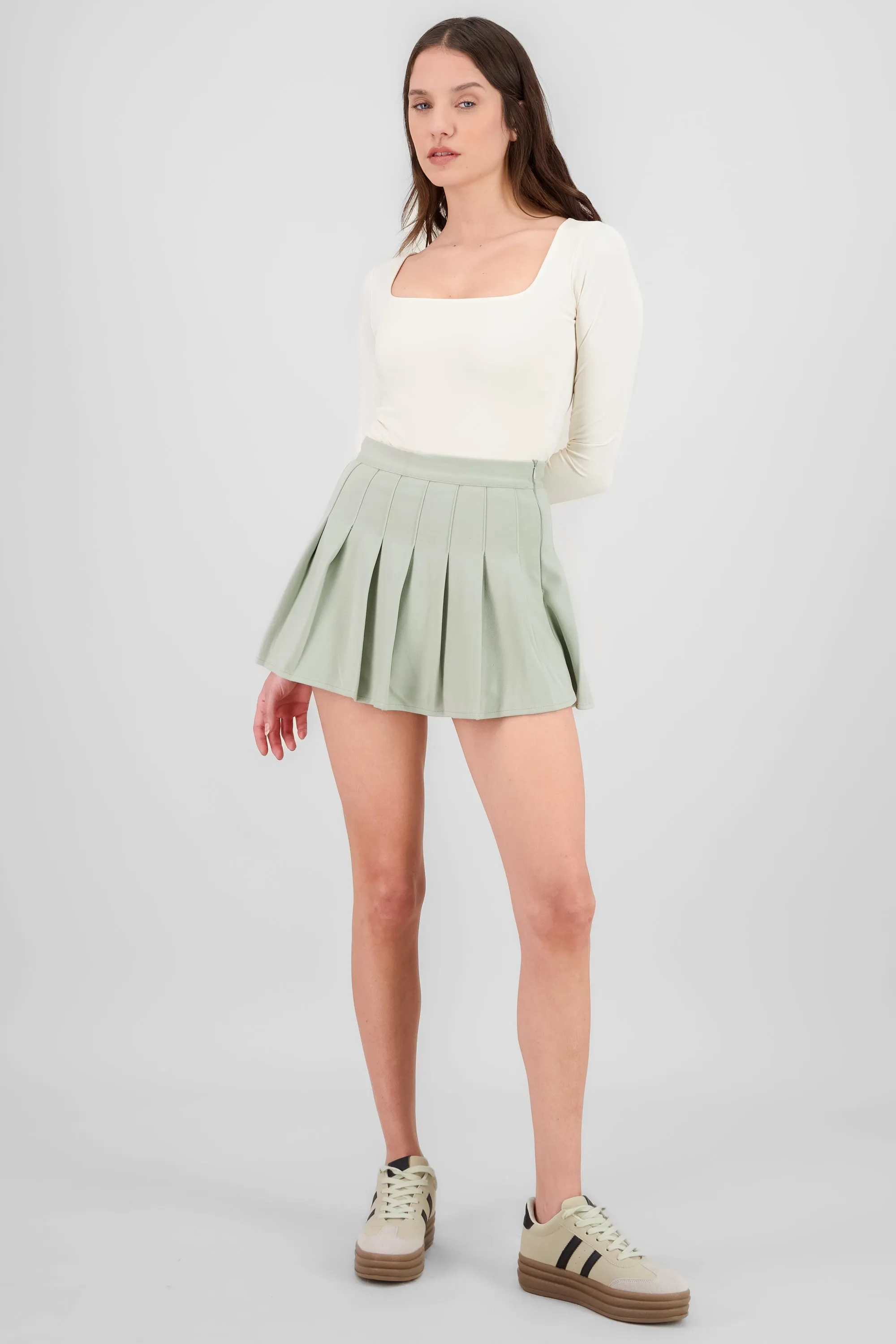 Falda mini plisada sold by Shasa