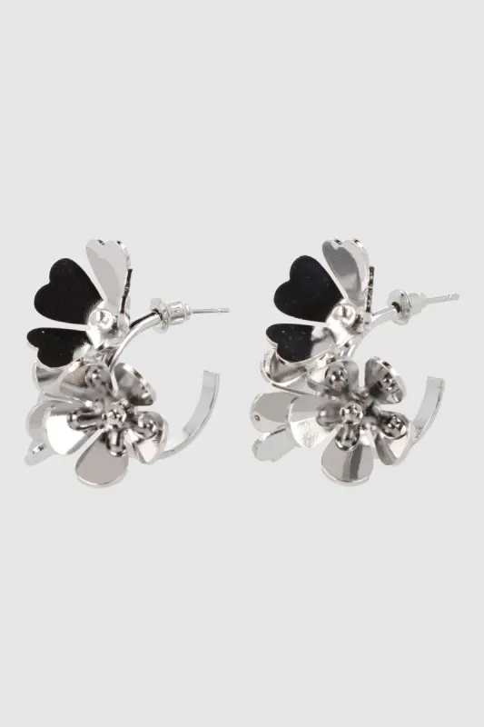 Arracadas petalos sold by Shasa