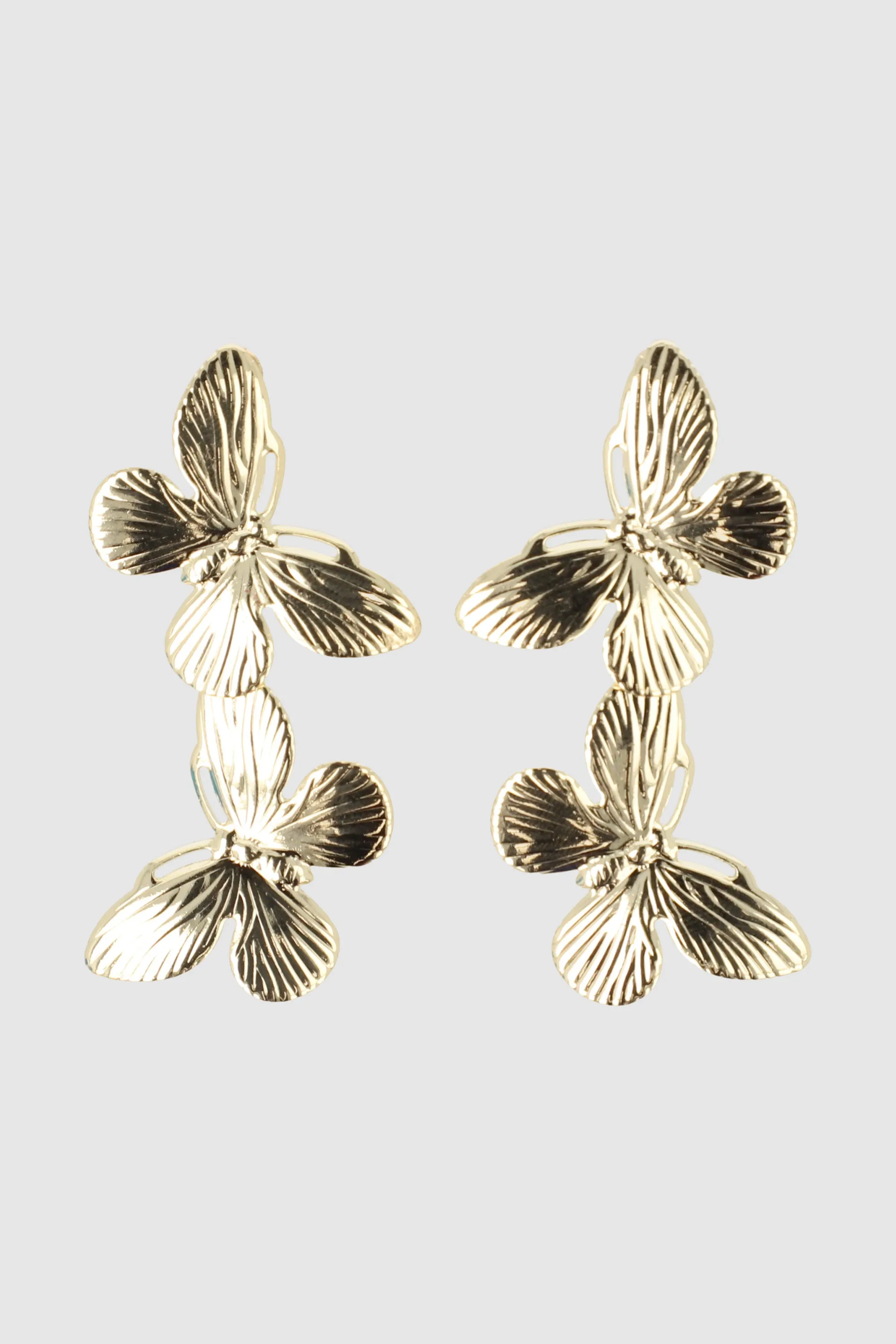 Aretes doble mariposas sold by Shasa product image thumbnail 2