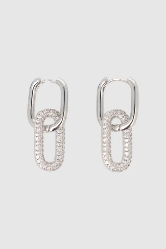 Arracadas eslabones brillos sold by Shasa