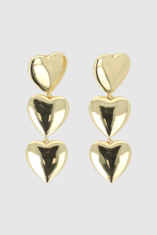 Aretes triple corazon sold by Shasa