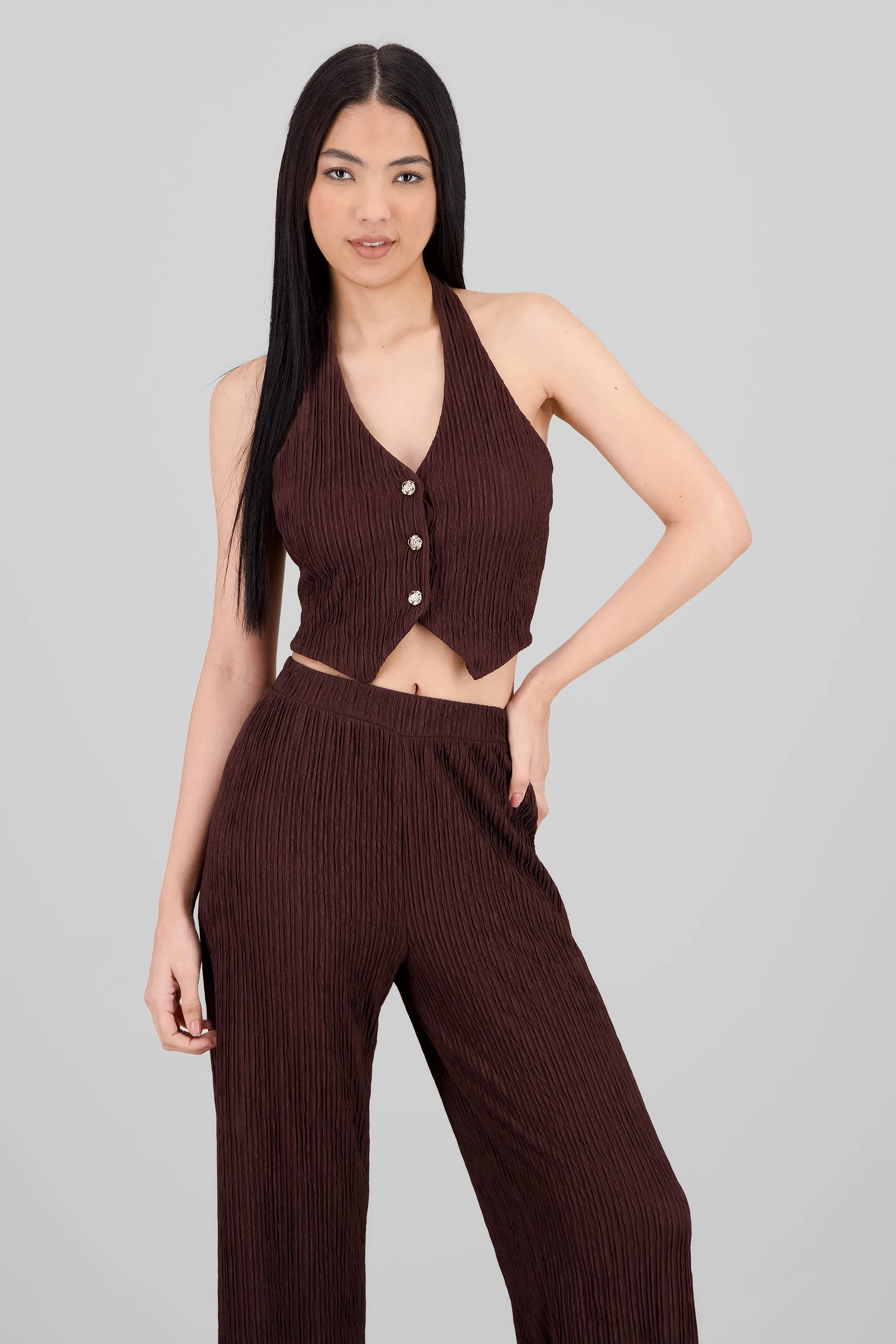 Top halter botones textura sold by Shasa