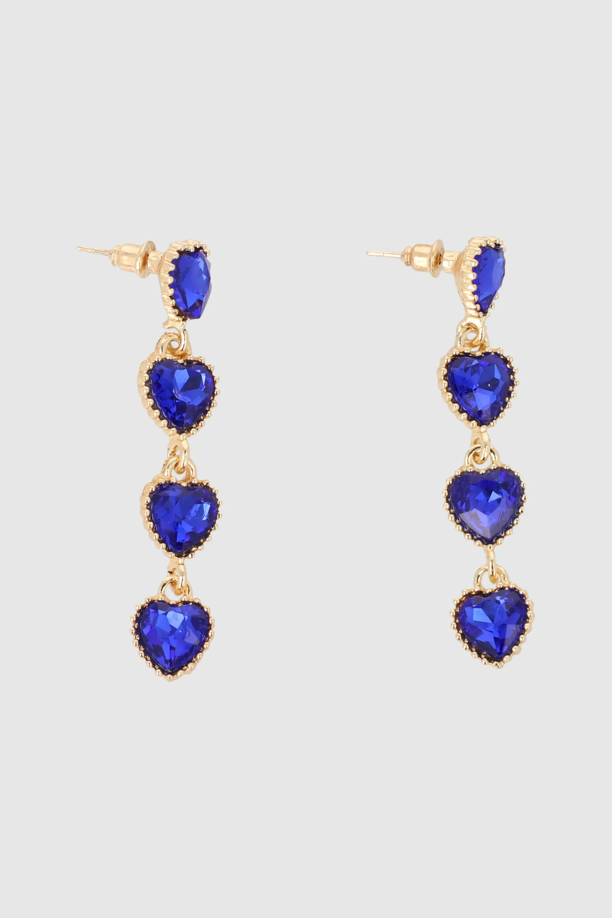 Aretes corazon cristales sold by Shasa