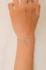Pulsera corazon silueta sold by Shasa