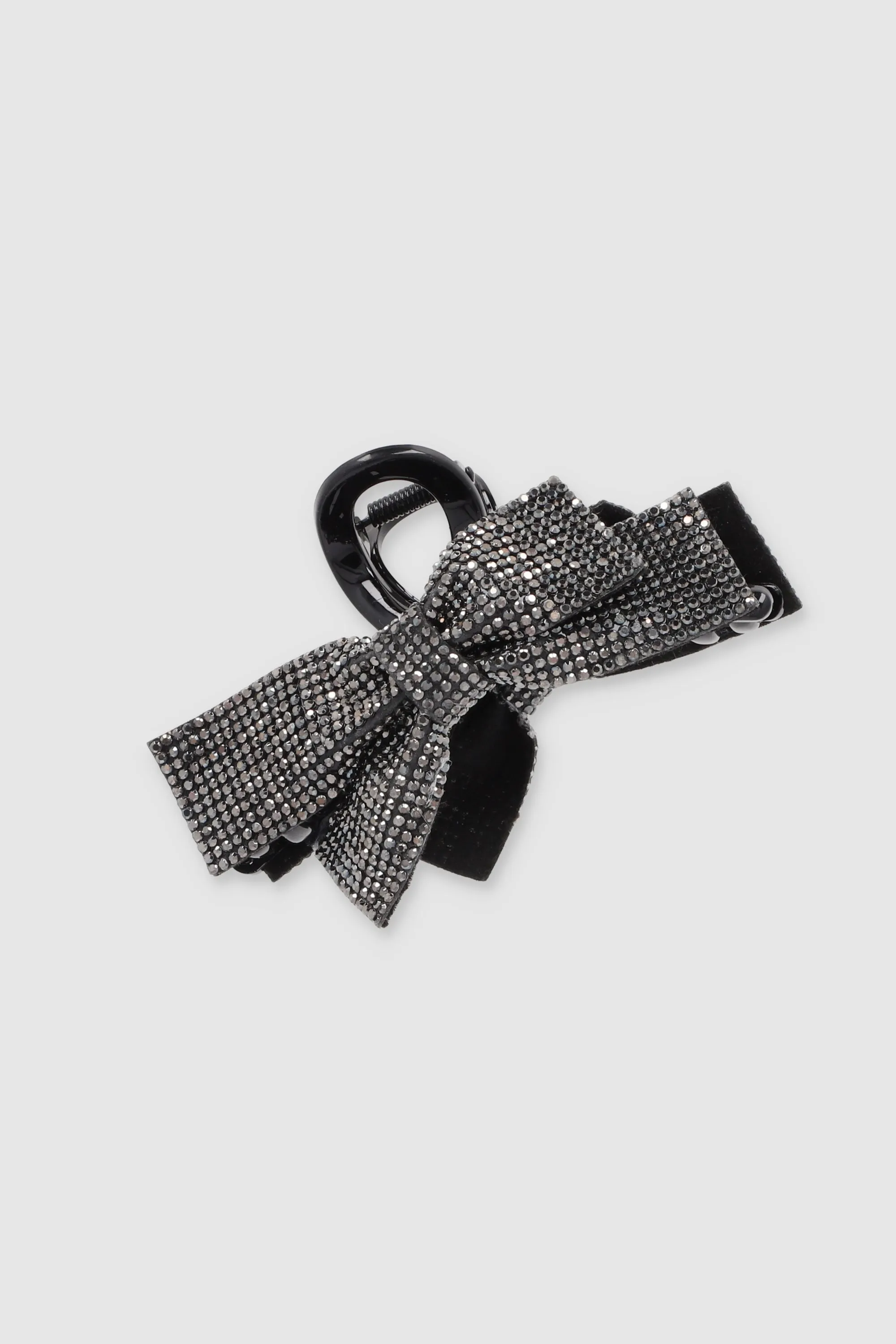 Pinza moño multi brillos sold by Shasa