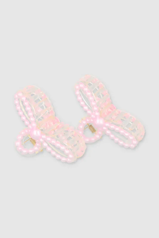 Set 2 pinzas perla moño sold by Shasa