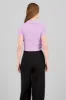 Top crop manga corta cuello polo sold by Shasa