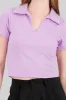 Top crop manga corta cuello polo sold by Shasa