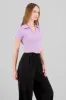 Top crop manga corta cuello polo sold by Shasa