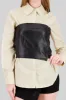 Camisa oversize detalle top tubo pu sold by Shasa