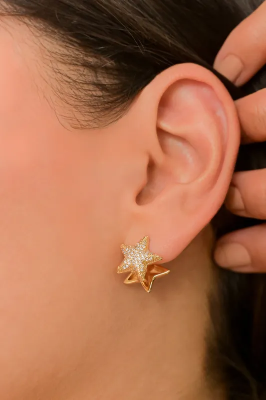 Aretes estrellas brillos sold by Shasa