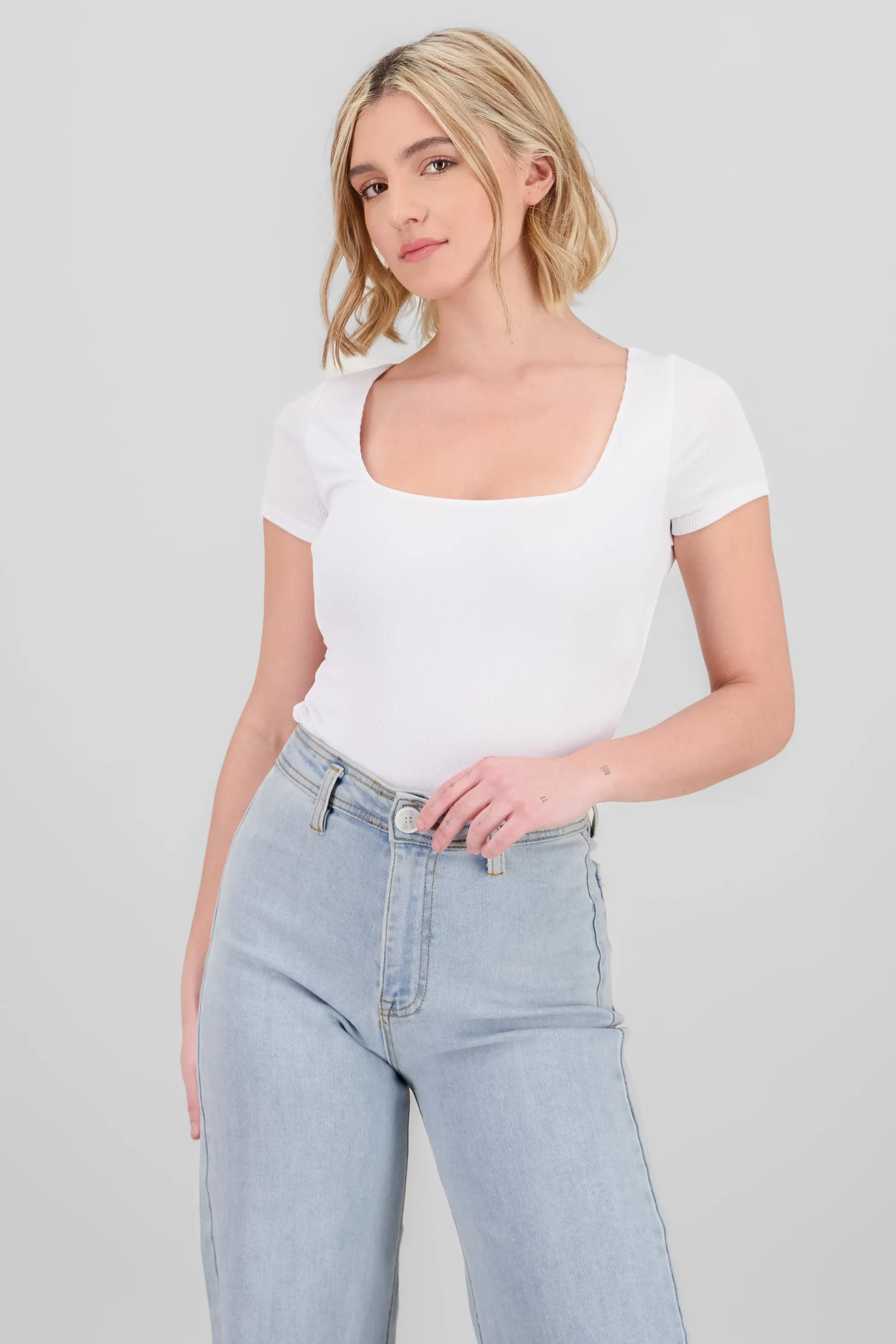 Body doble tela liso manga corta sold by Shasa