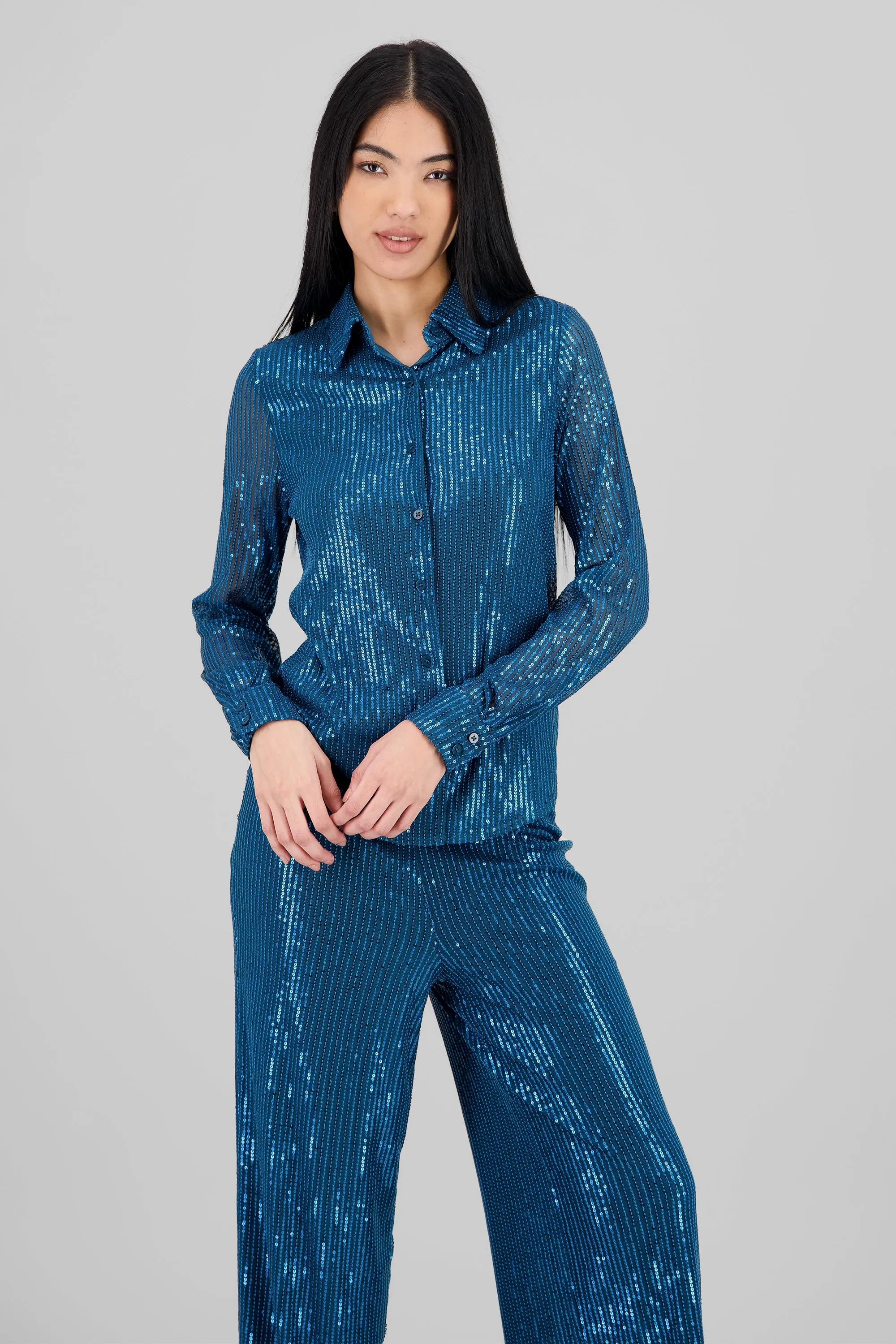 Camisa manga larga lentejuelas sold by Shasa