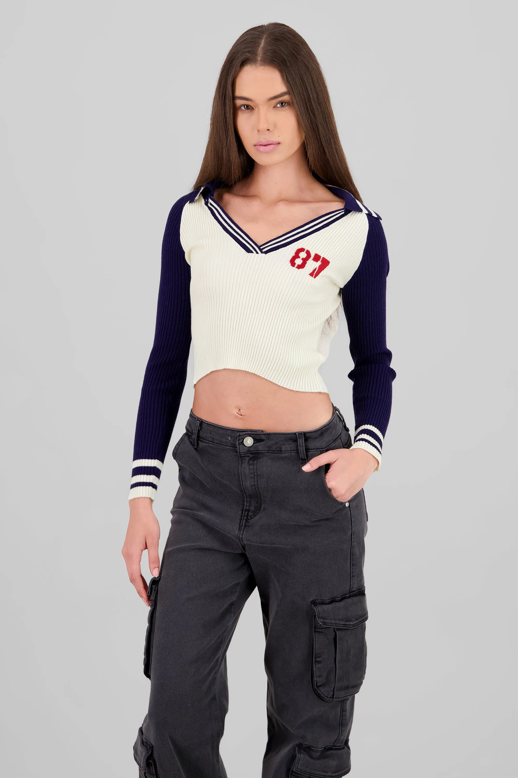 Top polo manga larga tejido contraste sold by Shasa