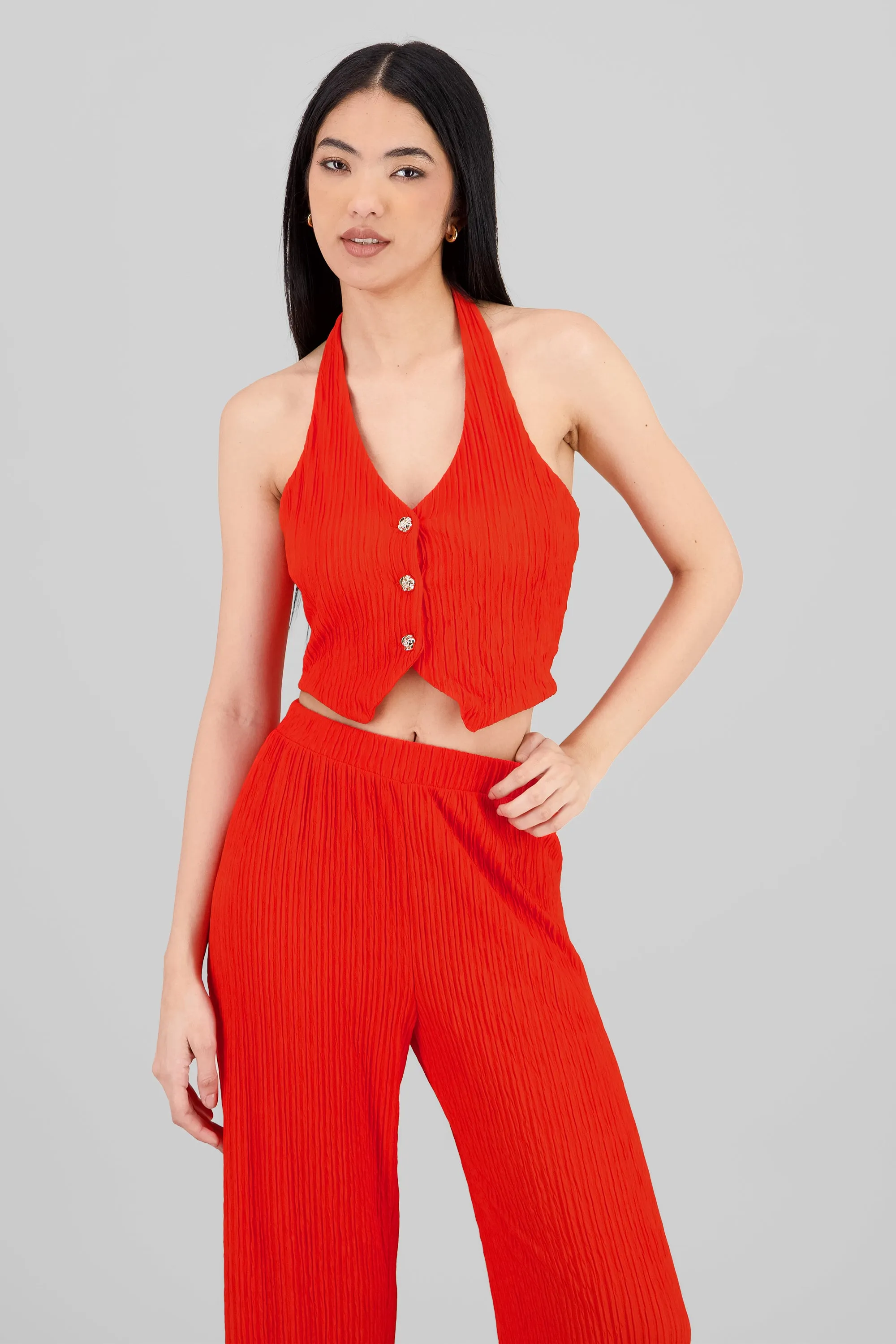 Top halter botones textura sold by Shasa