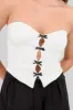 Top strapless detalle moños sold by Shasa