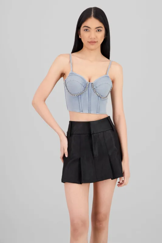 Corset denim con brillantes sold by Shasa