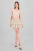 Falda mini cintura smock sold by Shasa