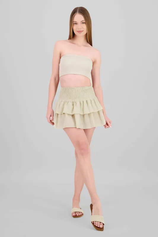 Falda mini cintura smock sold by Shasa