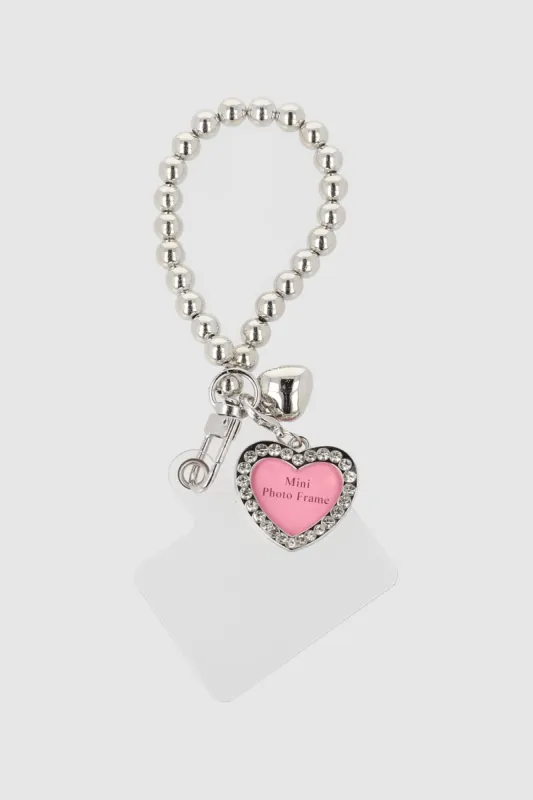 Cadena para celular corazon brillos sold by Shasa