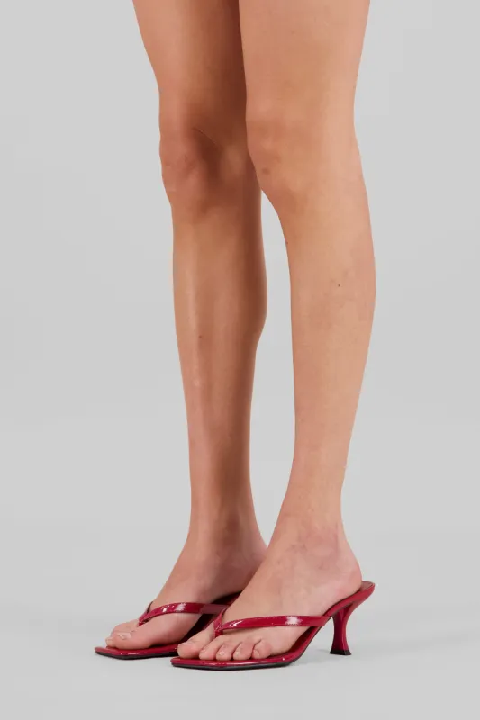 Tacón tira pata de gallo charol sold by Shasa