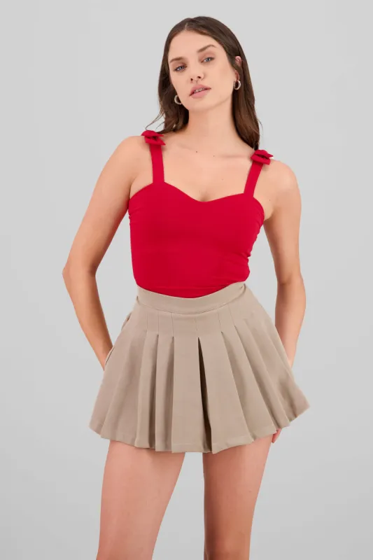 Bodysuit liso con tirante moños sold by Shasa