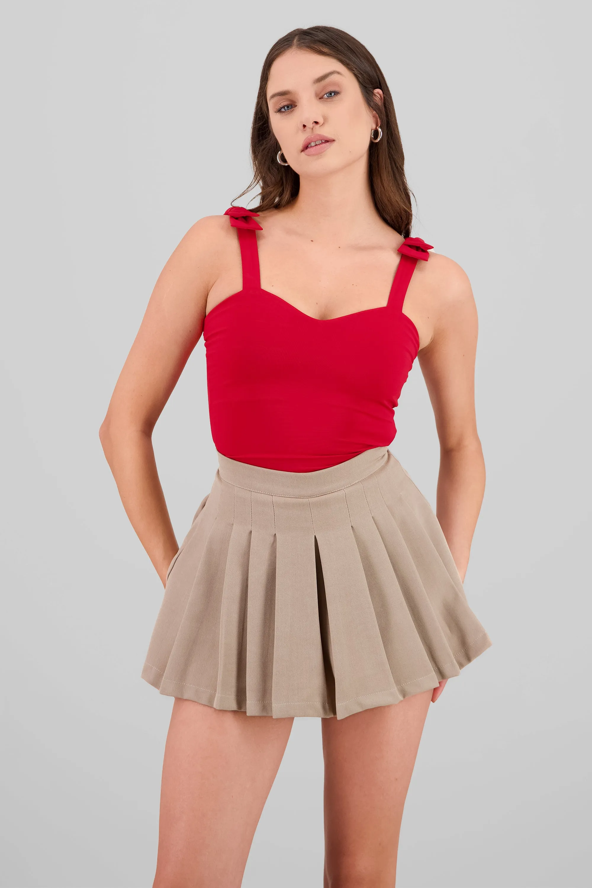 Bodysuit liso con tirante moños sold by Shasa