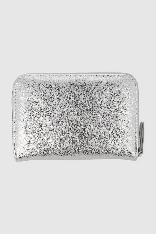 Cartera pequeña cierre studs metalizada sold by Shasa