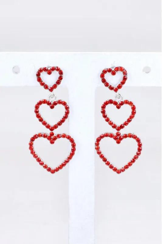 Aretes triple corazon sold by Shasa