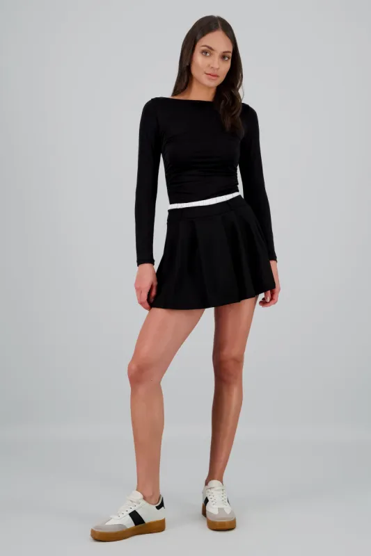 Falda tableada doble pretina sold by Shasa