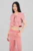 Blusa cuadros moños sold by Shasa